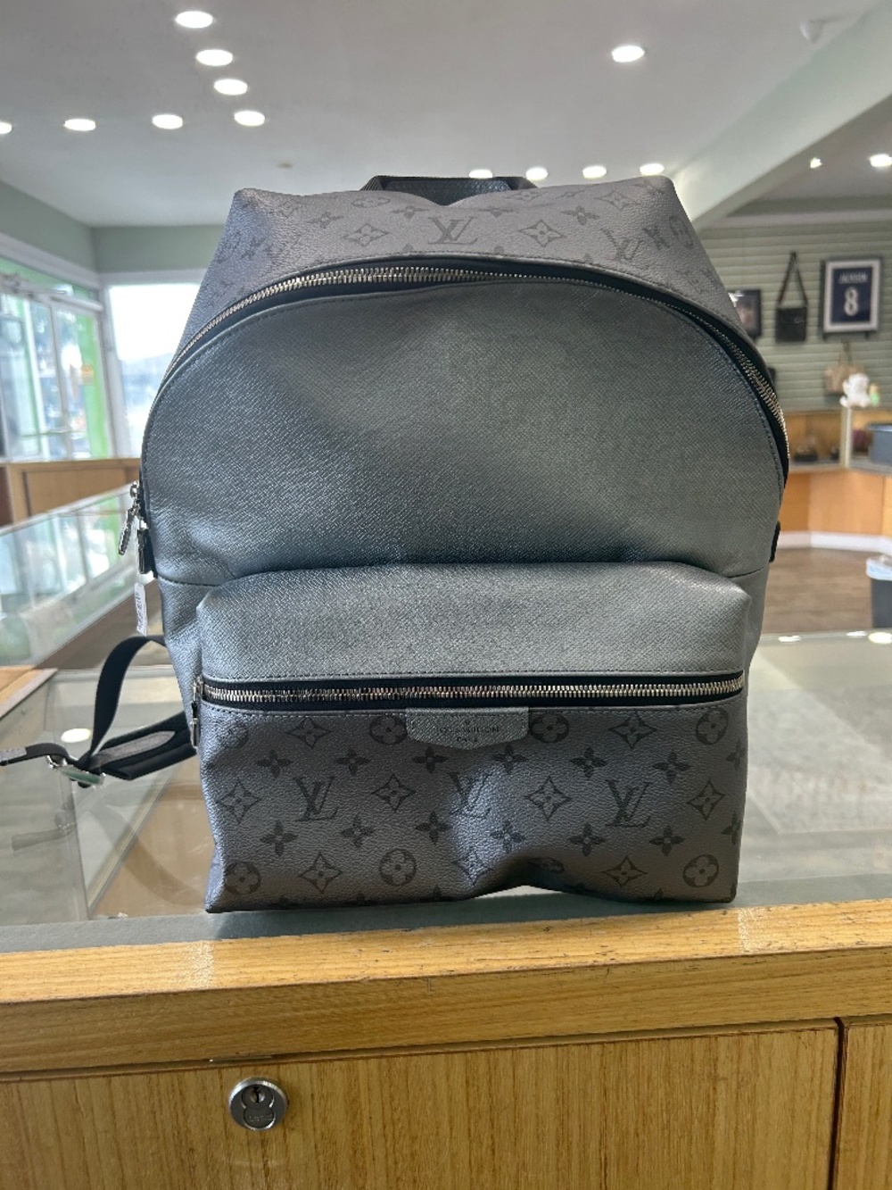 Pre Owned Louis Vuitton PM Discovery Backpack Monogram Taigarama